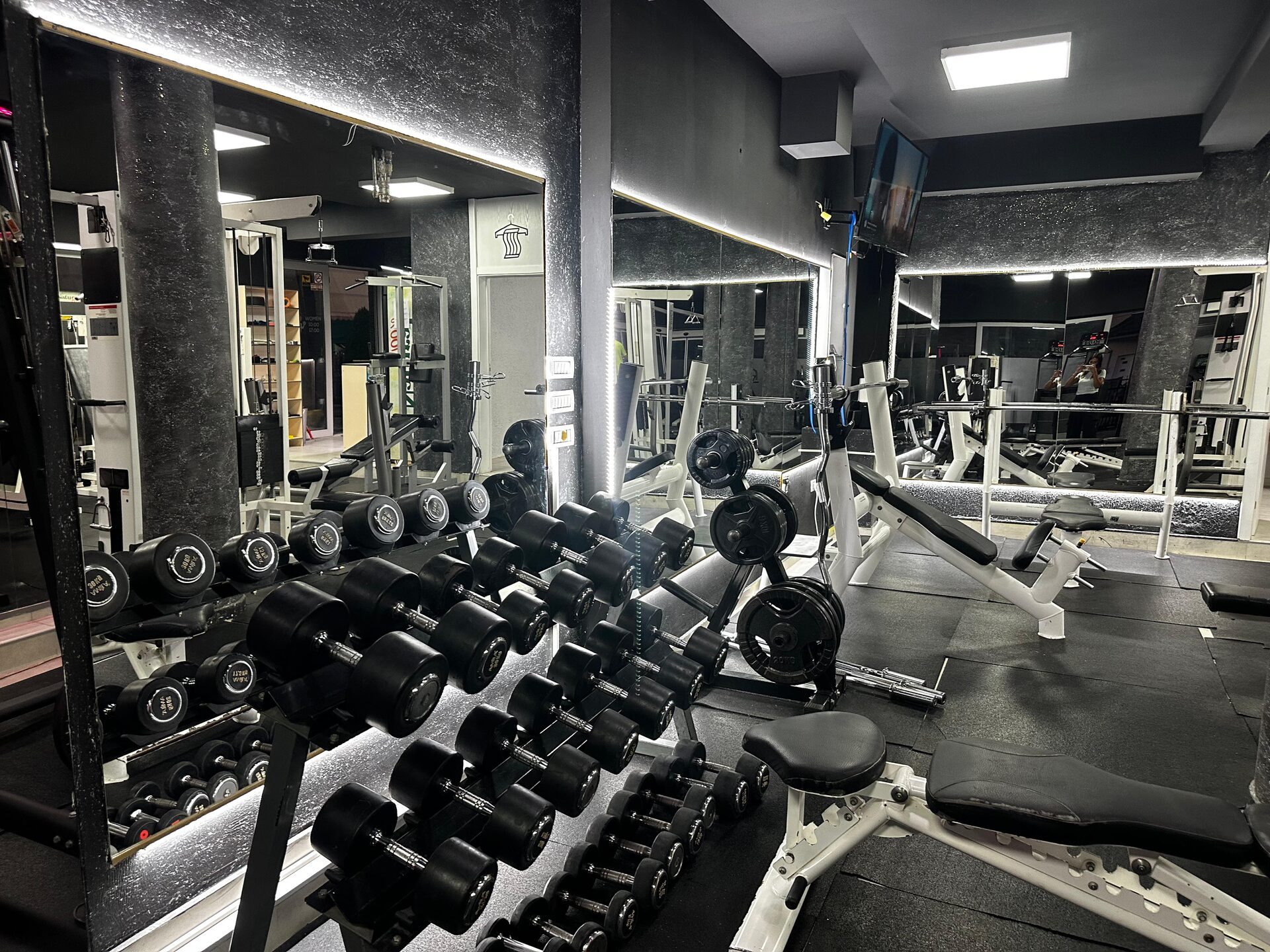Rows of dumbbells close up